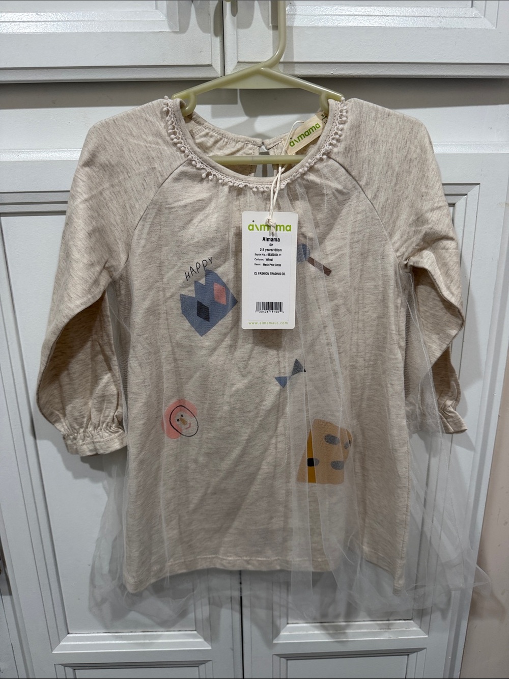 Cream Long-Sleeve Girls' Top with Tulle Hem